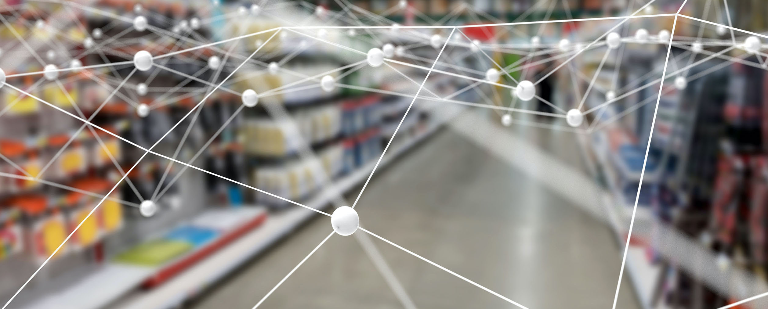 Rete di nodi connessi sopra la corsia di un supermercato